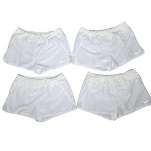 Nike dri fit white running shorts set of 4. pocket on back with lining size Larg